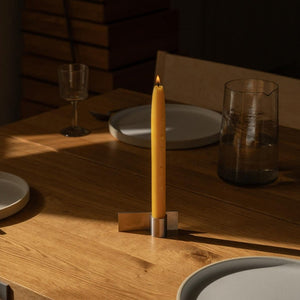 FUNDAMENT CANDLE HOLDER | STAINLESS STEEL | FORM 3 on dining table