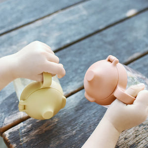 bonbo baby mug being held by baby