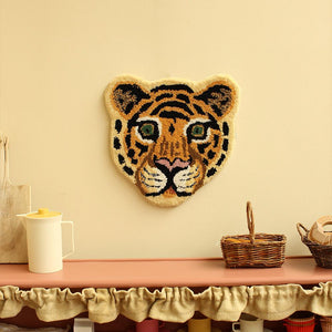 cloudy tiger wool rug by doing goods on wall 