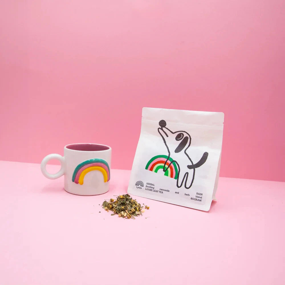 herbal tea with dog and rainbow packaging