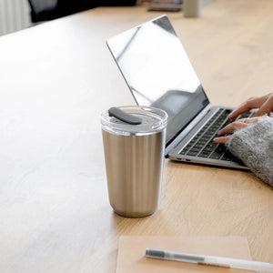 stainless steel to go tumbler by kinto on working desk