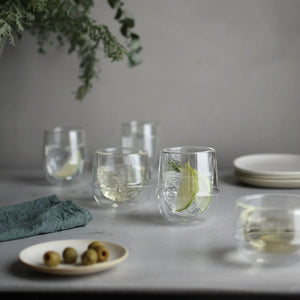 doubled wall glass collection by kinto styled on table