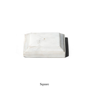 white incense holder made of marble