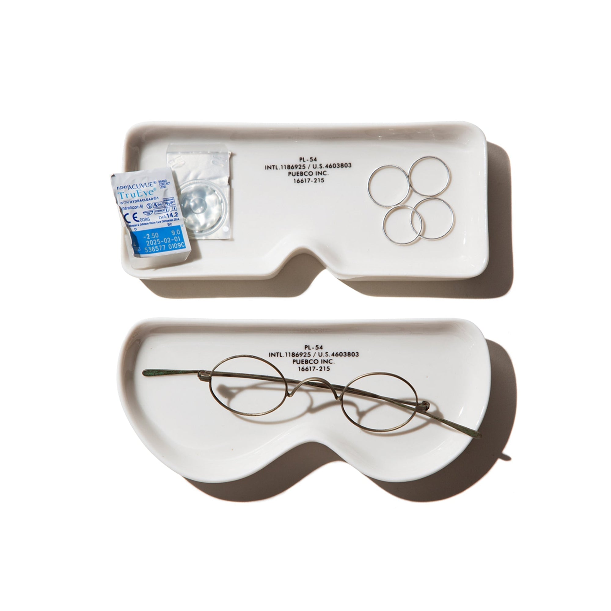 white ceramic eyeware plate by puebco